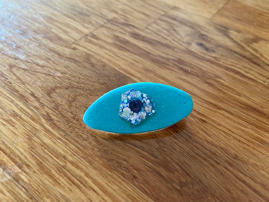 Blue eye brooch