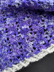 Purple knitted scarf